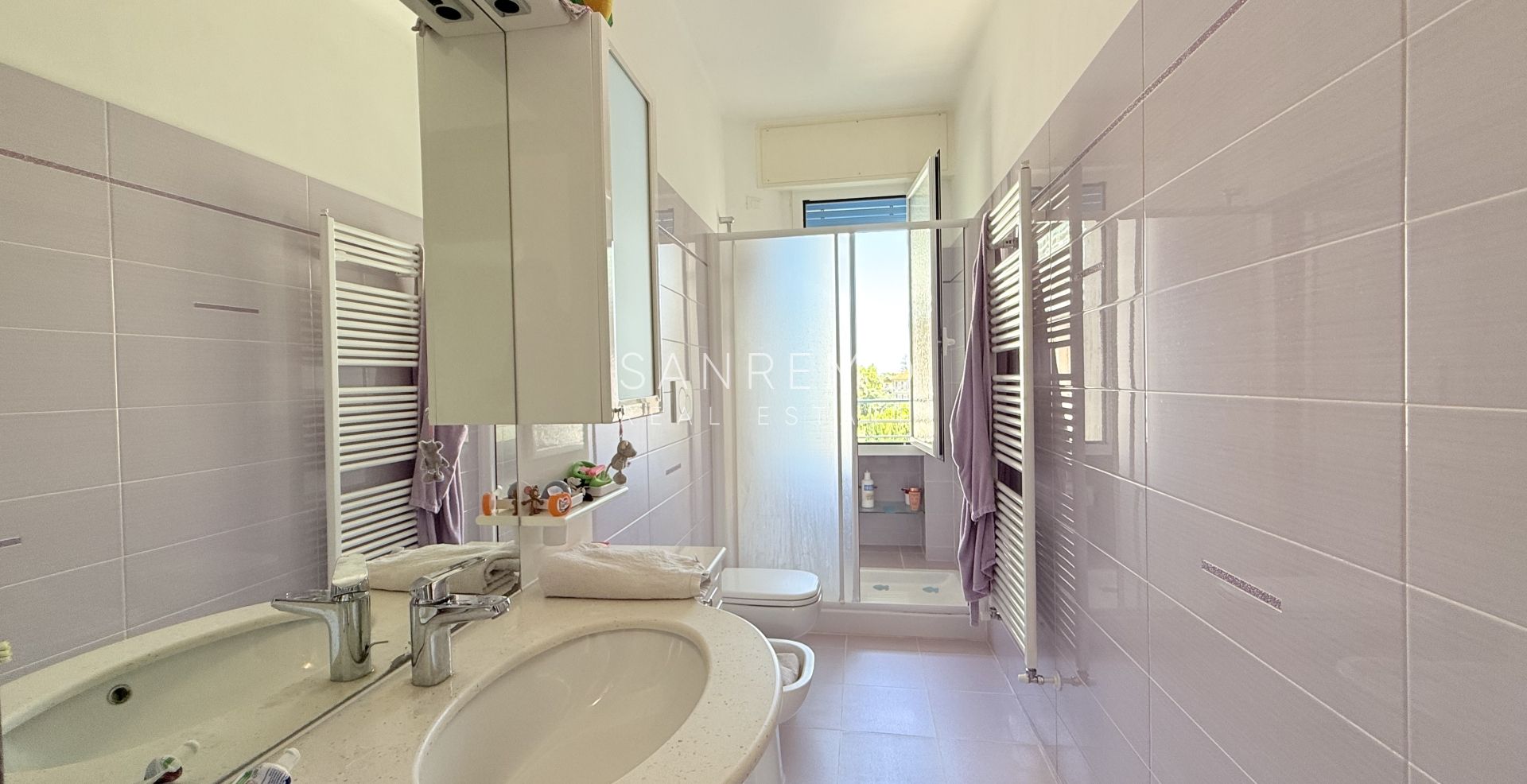 Beautifully Renovated Apartment with Two Terraces Near the Train Station