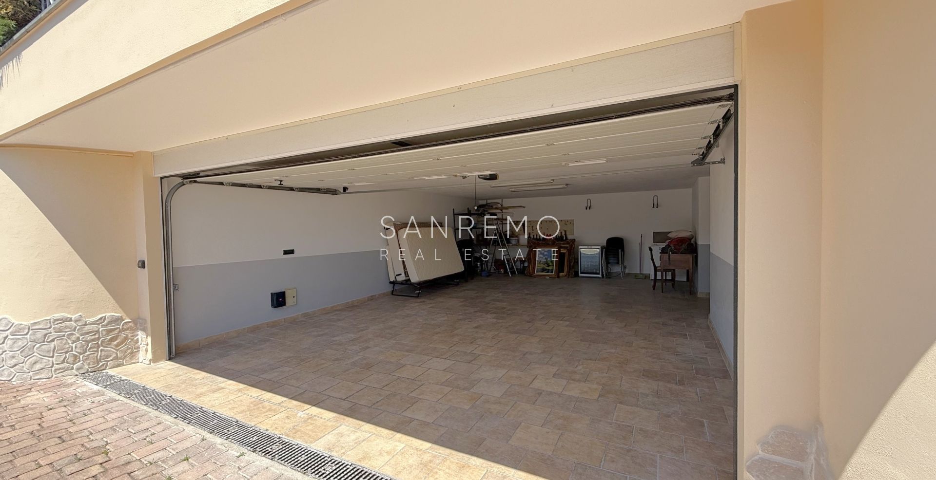 Beautiful villa surrounded by greenery with swimming pool and sea view