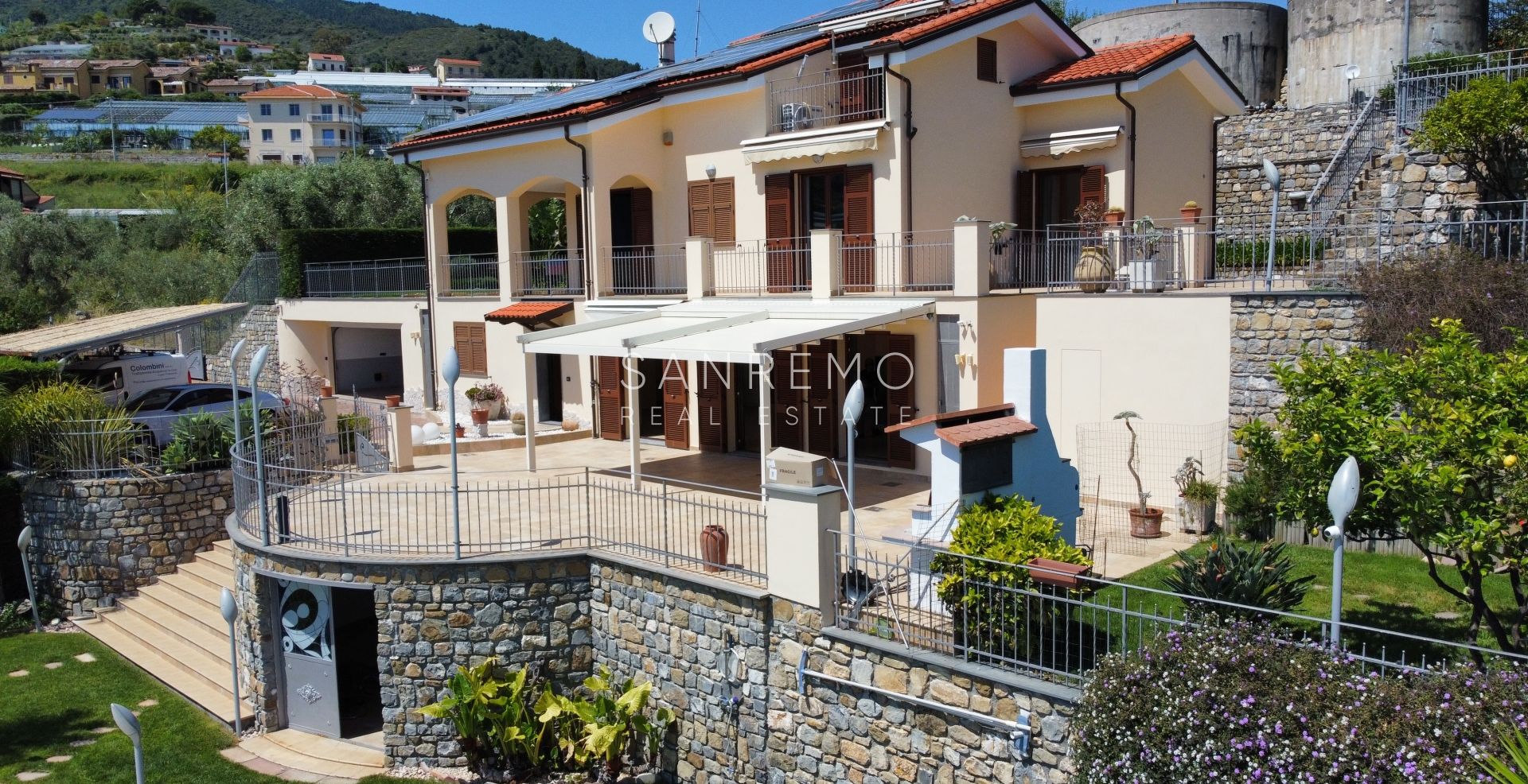 Beautiful villa surrounded by greenery with swimming pool and sea view