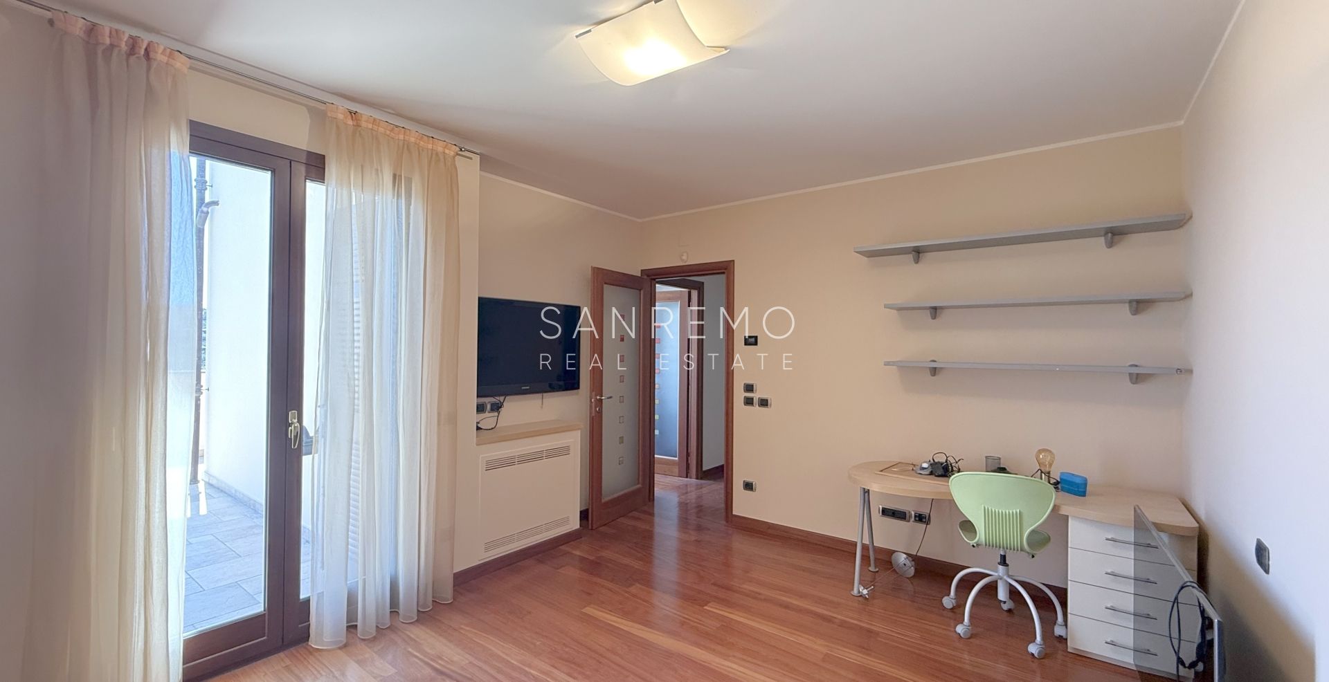 Beautiful villa surrounded by greenery with swimming pool and sea view