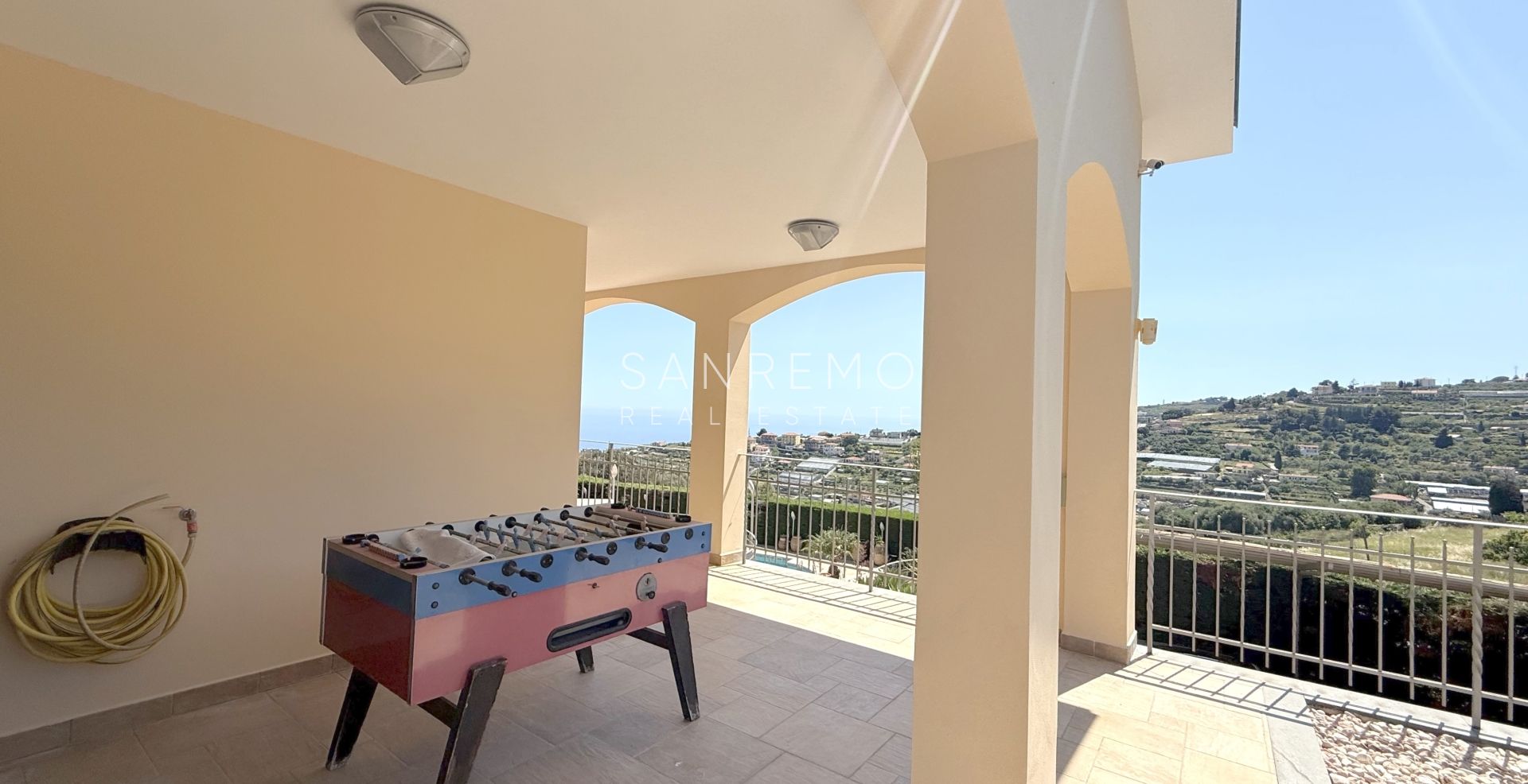 Beautiful villa surrounded by greenery with swimming pool and sea view