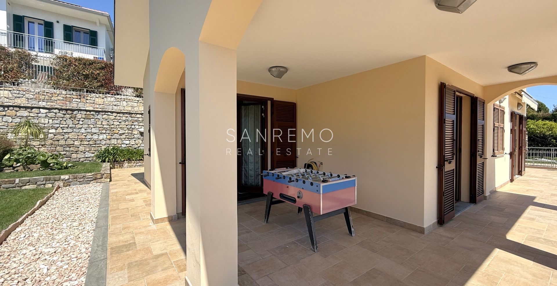 Beautiful villa surrounded by greenery with swimming pool and sea view