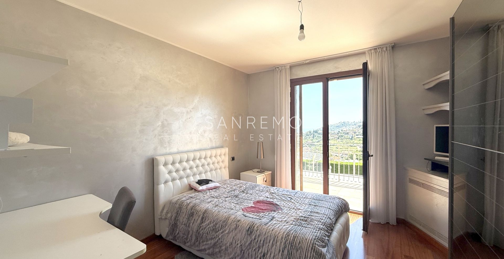 Beautiful villa surrounded by greenery with swimming pool and sea view