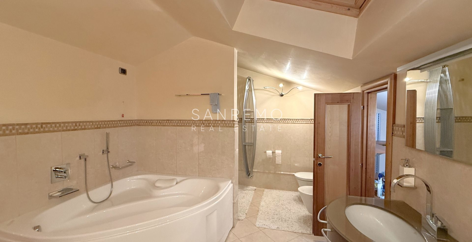 Beautiful villa surrounded by greenery with swimming pool and sea view