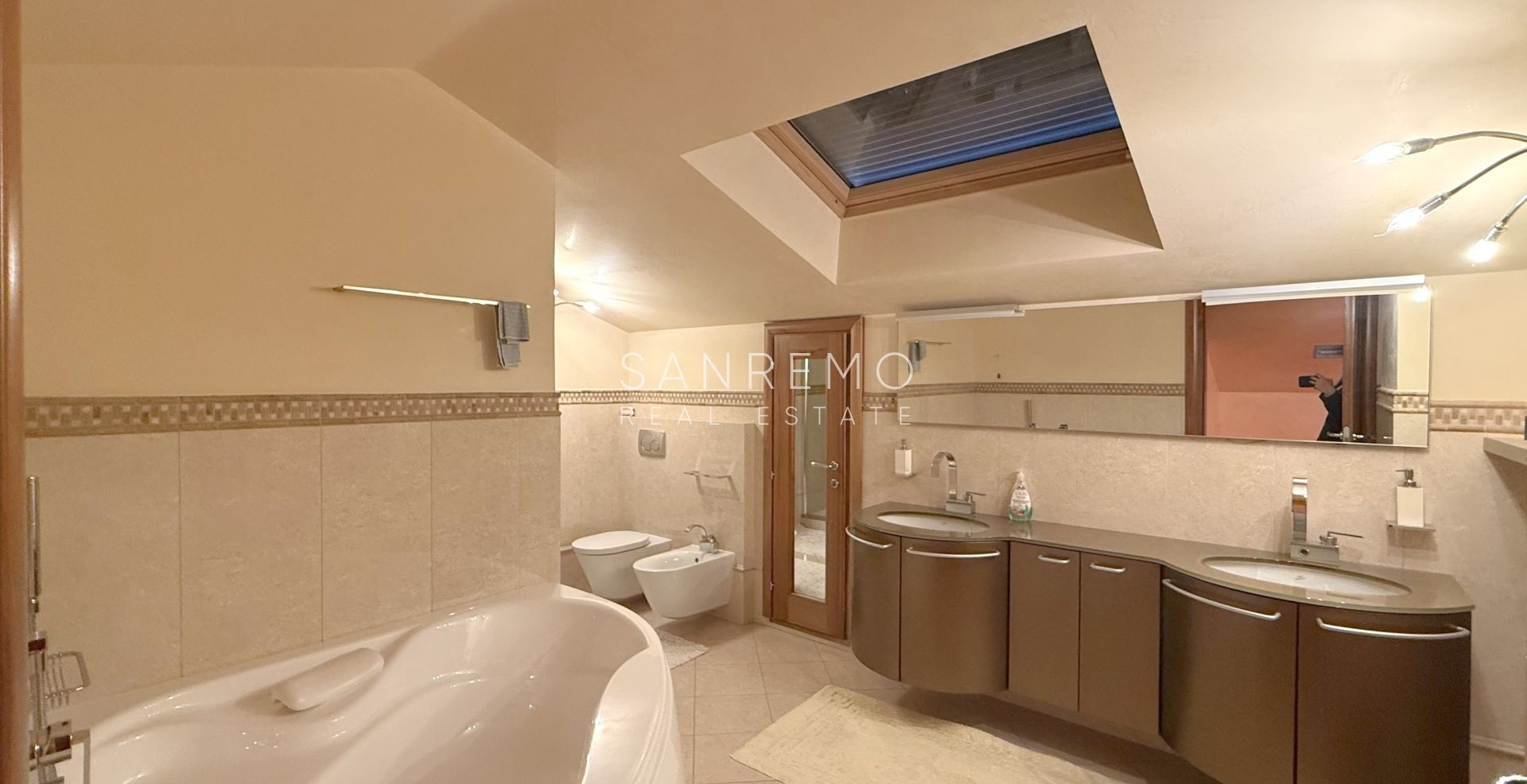 Beautiful villa surrounded by greenery with swimming pool and sea view