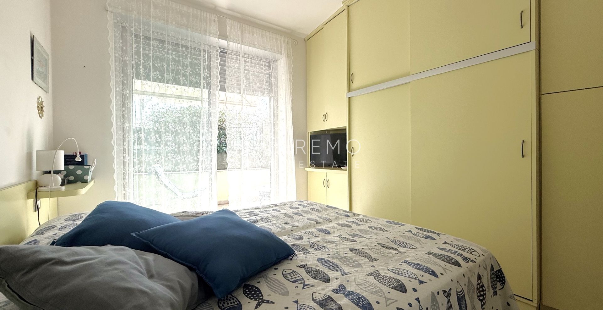 Charming two-room apartment with private garden and garage