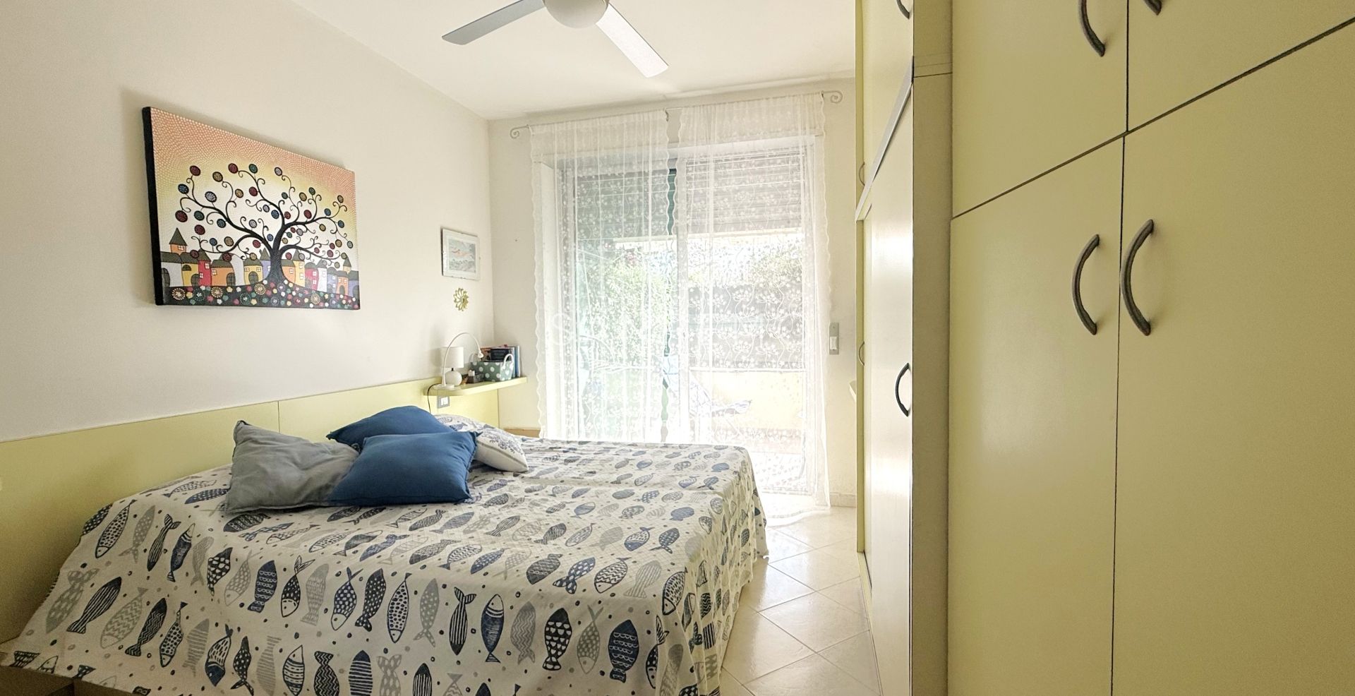 Charming two-room apartment with private garden and garage