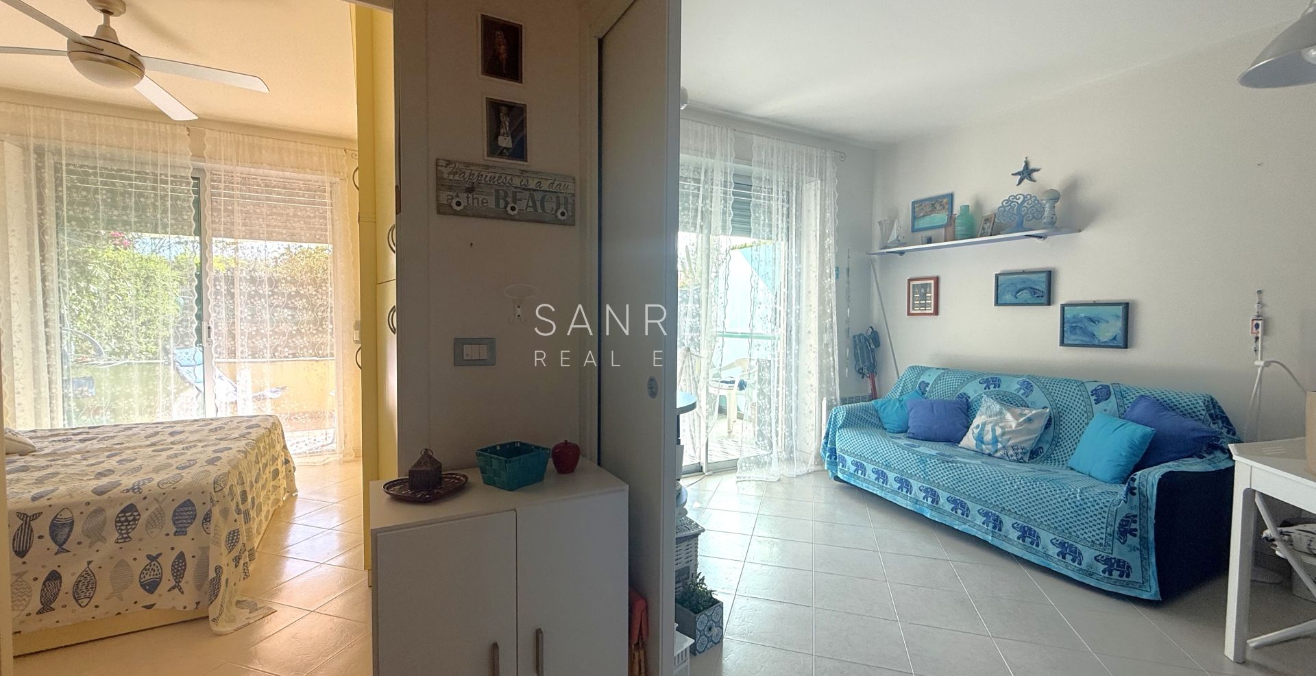 Charming two-room apartment with private garden and garage