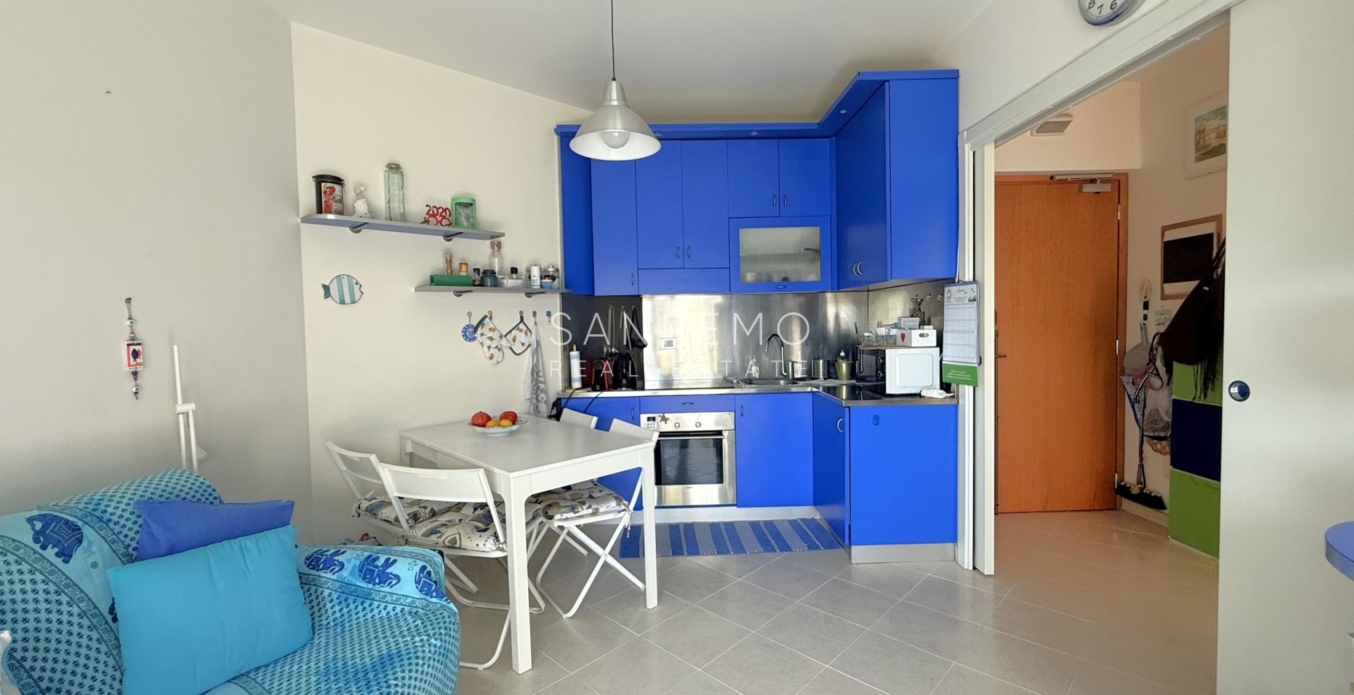 Charming two-room apartment with private garden and garage