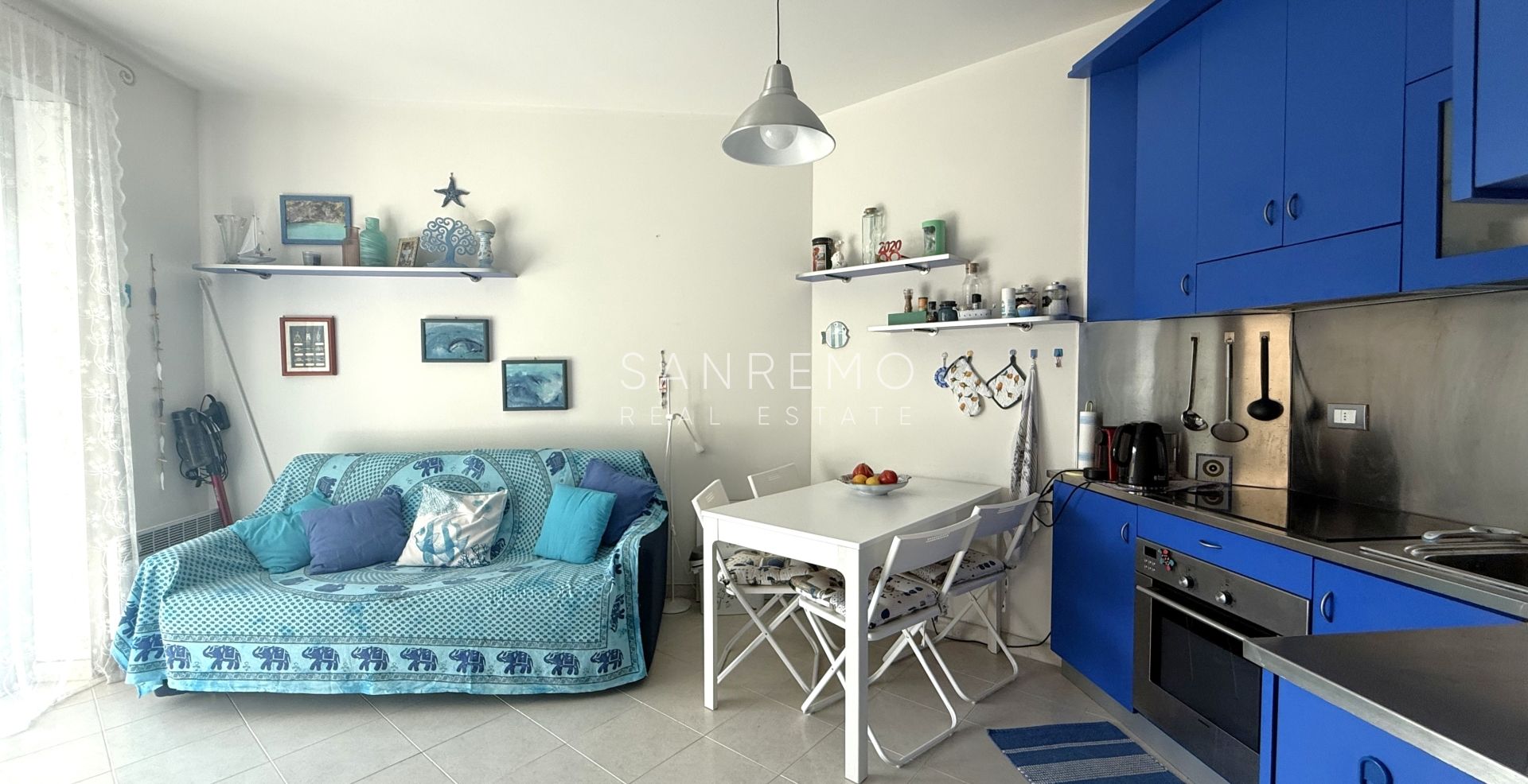 Charming two-room apartment with private garden and garage