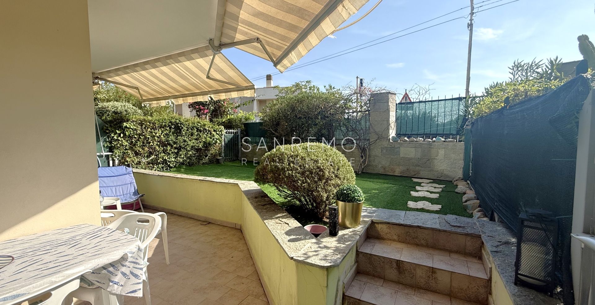Charming two-room apartment with private garden and garage
