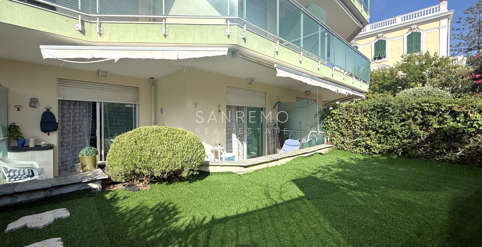 Charming two-room apartment with private garden and garage