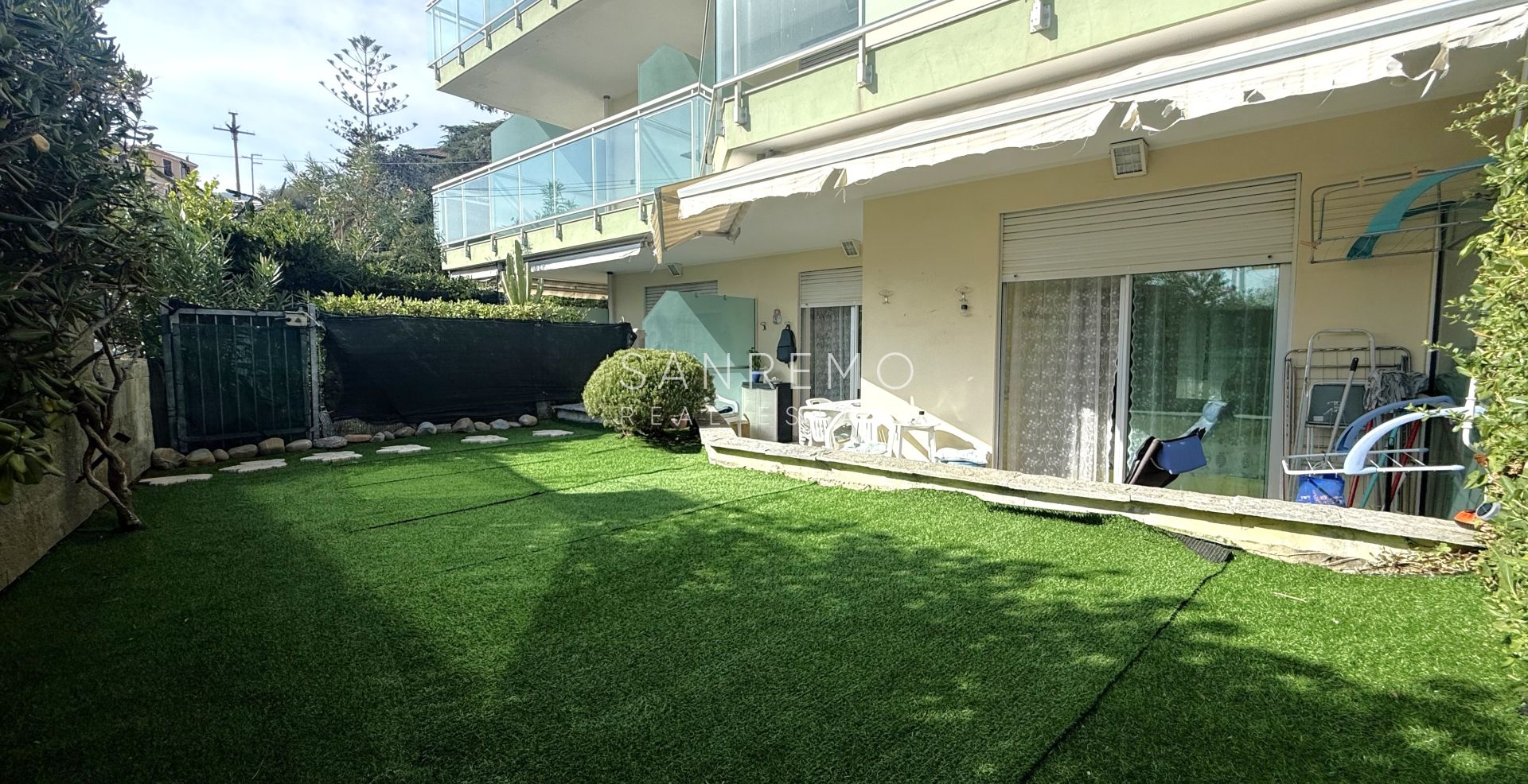Charming two-room apartment with private garden and garage