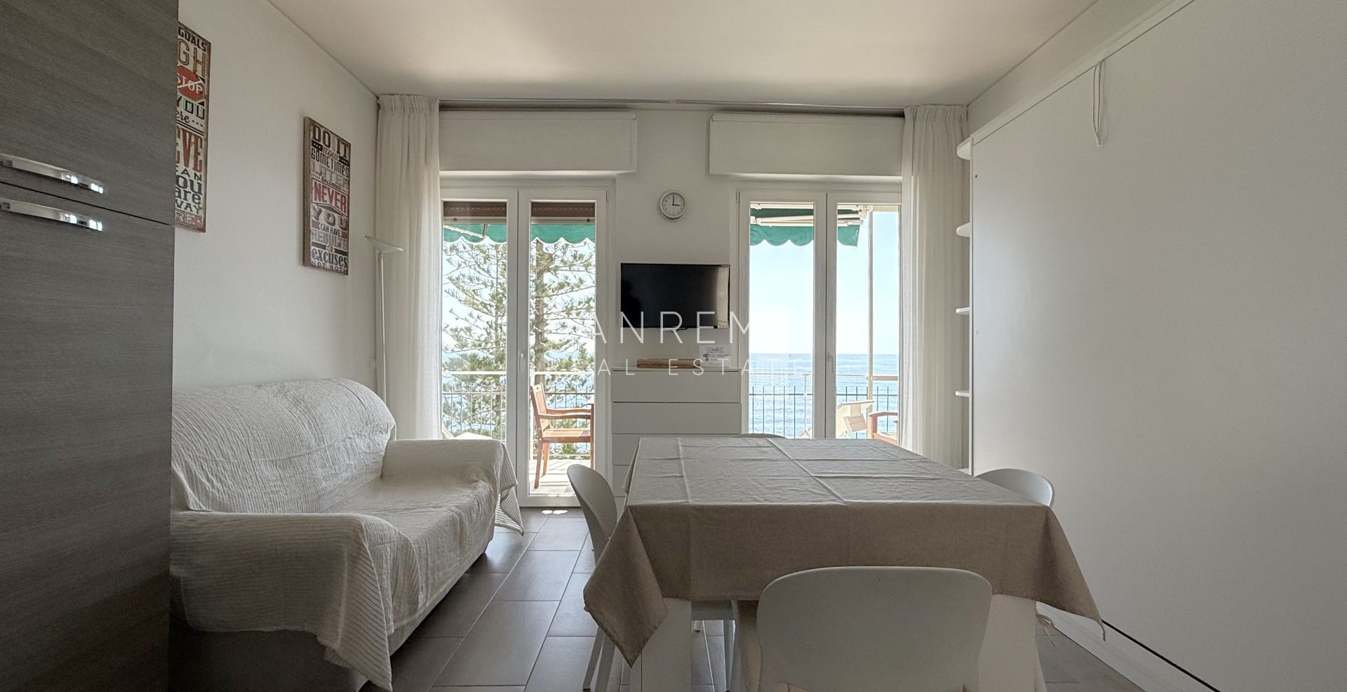 Bright one-bedroom apartment with a spacious terrace directly overlooking the sea
